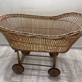 Rattan cradle on casters with mattress