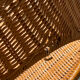 Wicker and black wrought iron armchair