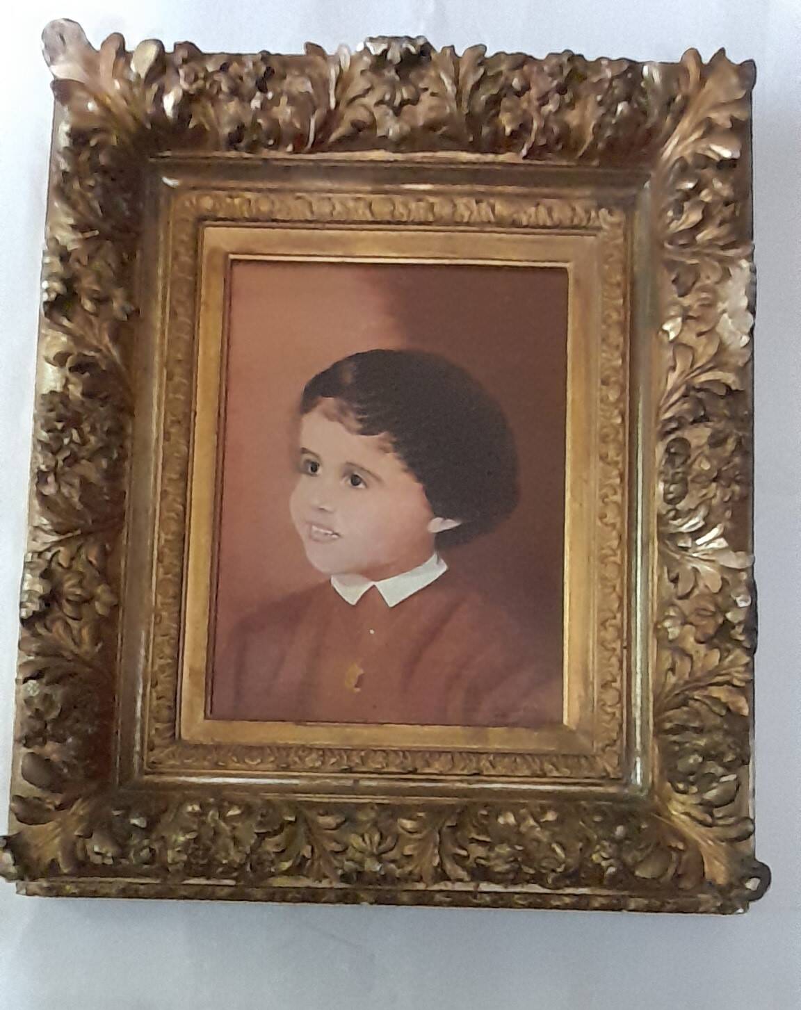 Portrait of a child signed Yvonne Hiack late 19th century 54 X 47 cm