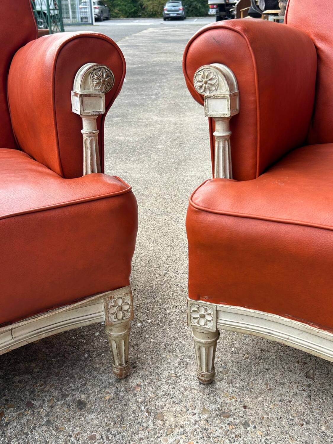 Pair of neoclassical bergère armchairs by Maison Jansen circa 1950.