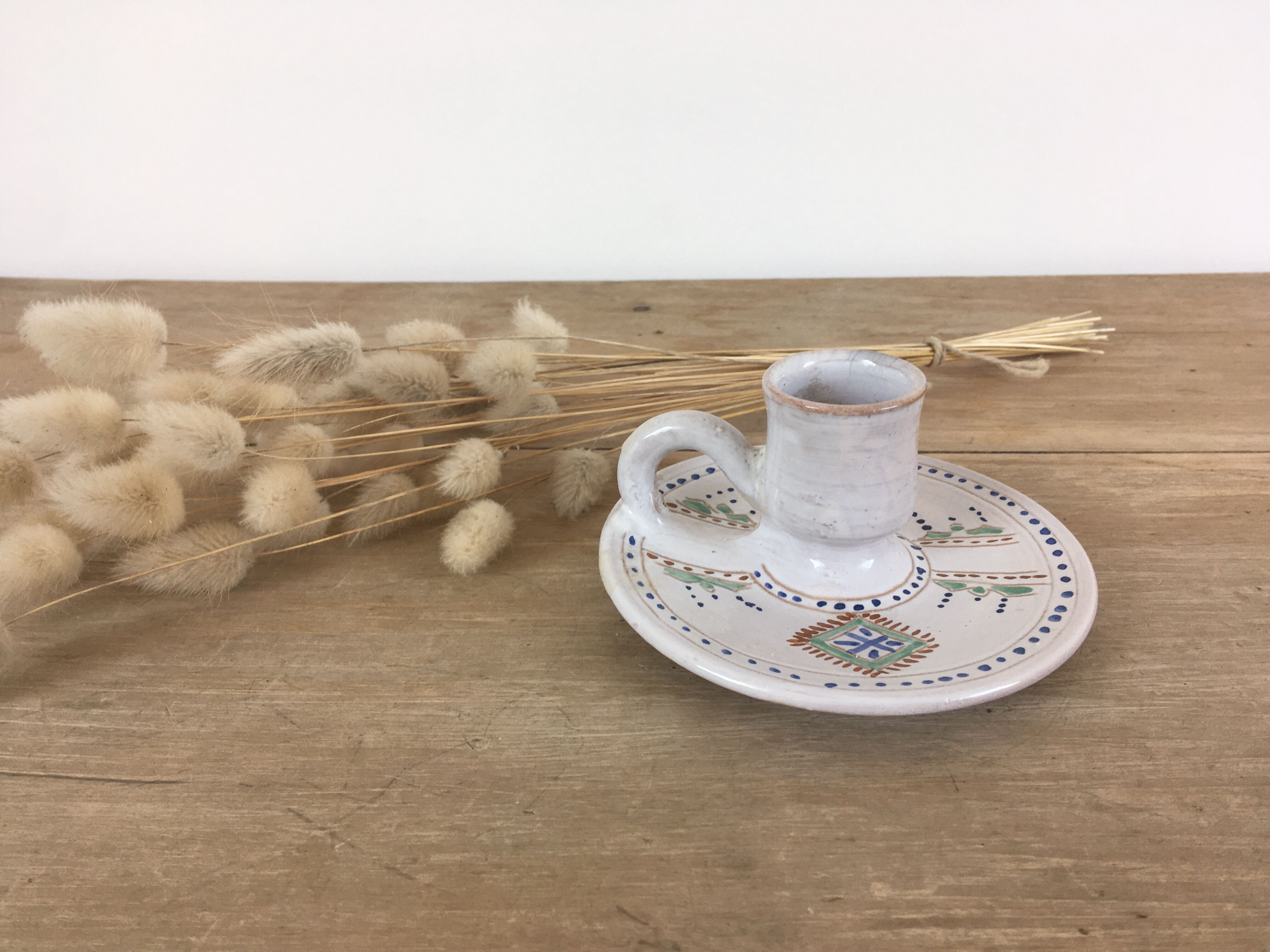 Green ceramic cellar rat candle holder