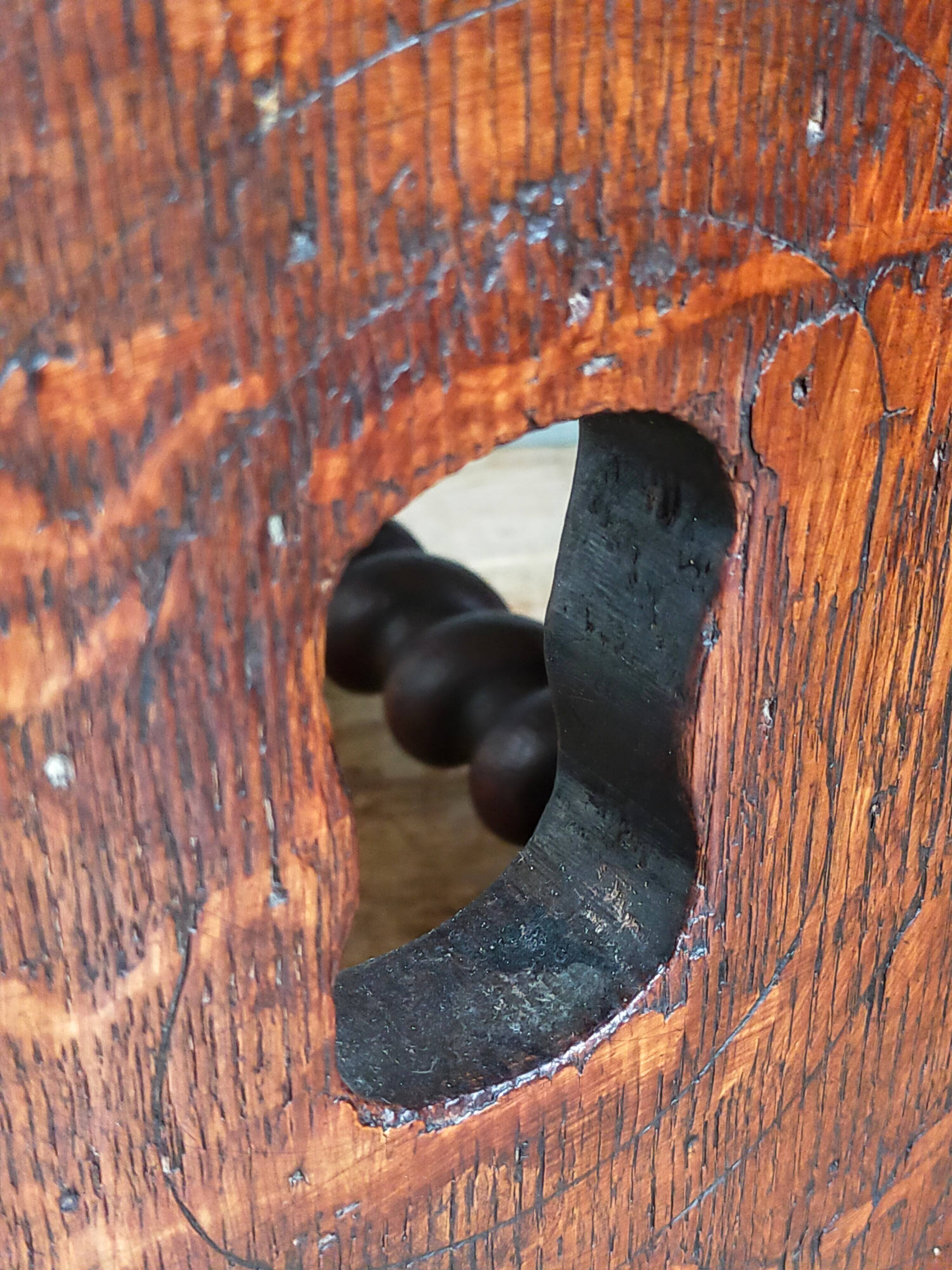 Antique stool in turned and carved solid wood