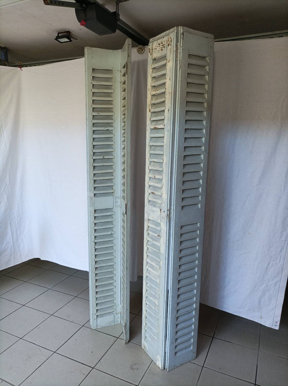 Louvered wooden shutter