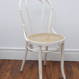 White wooden chair with cannage