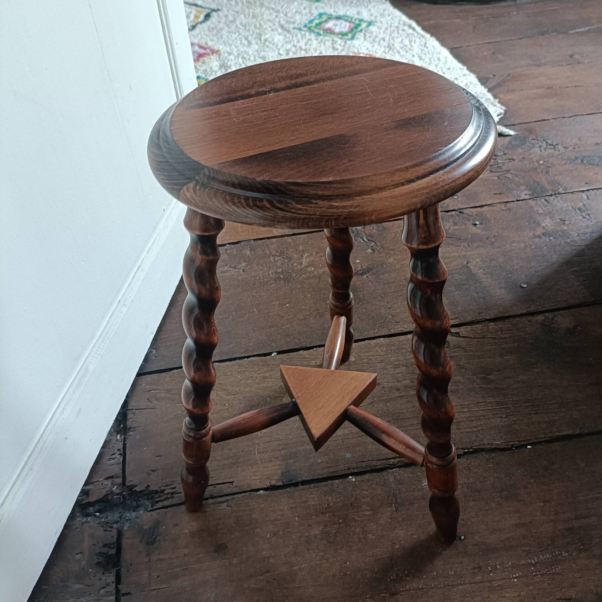Tripod stool with turned legs