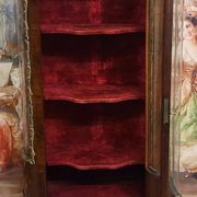 Curved display cabinet in Louis XV style with precious wood marquetry and gilded bronze.