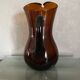 Ancienne carafe en verre ambré