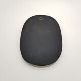 Brass oval mirror and blue cabochons