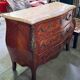 Curved Louis XV style commode with marquetry, opening with three drawers.