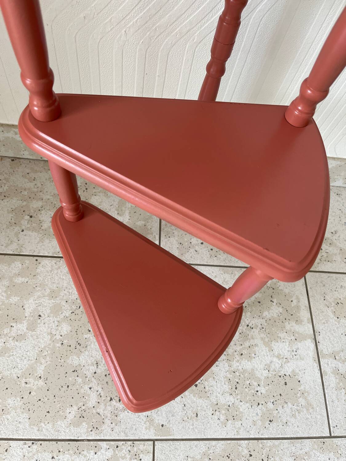 Old plant holder repainted in terracotta