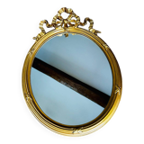 Miroir ancien ovale a fronton noeud
