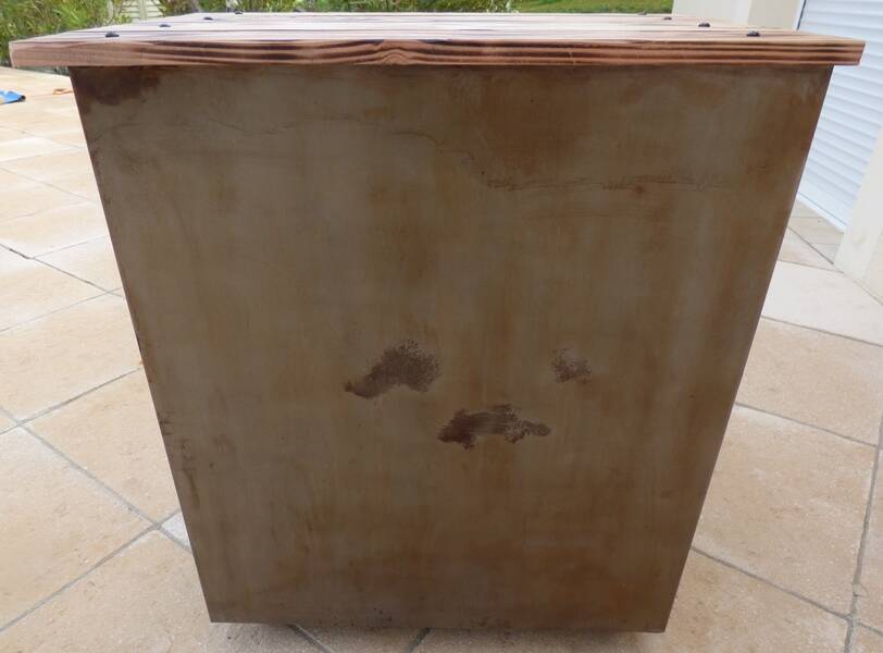Old industrial furniture in rusty effect metal with two drawers on casters