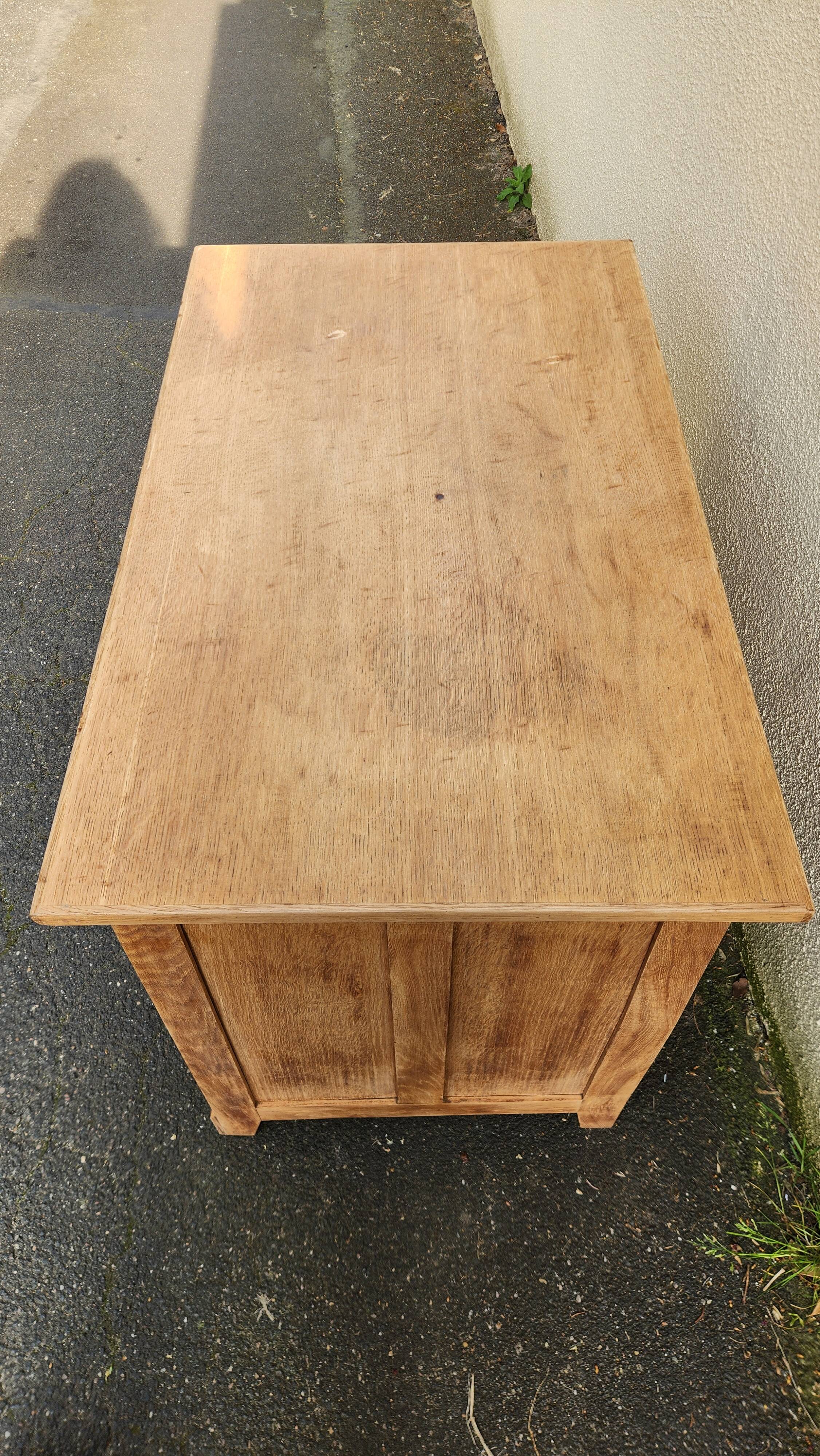 Vintage wooden desk with five drawers from the 1950s-1970s.