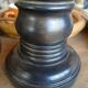 2 carved wooden candlesticks