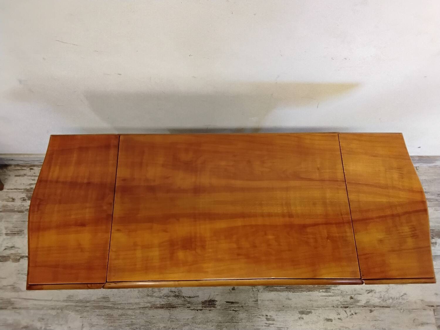 Small wooden drop-leaf table