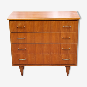 Commode des années 50-60 en acajou doré 4 tiroirs pieds fuseaux