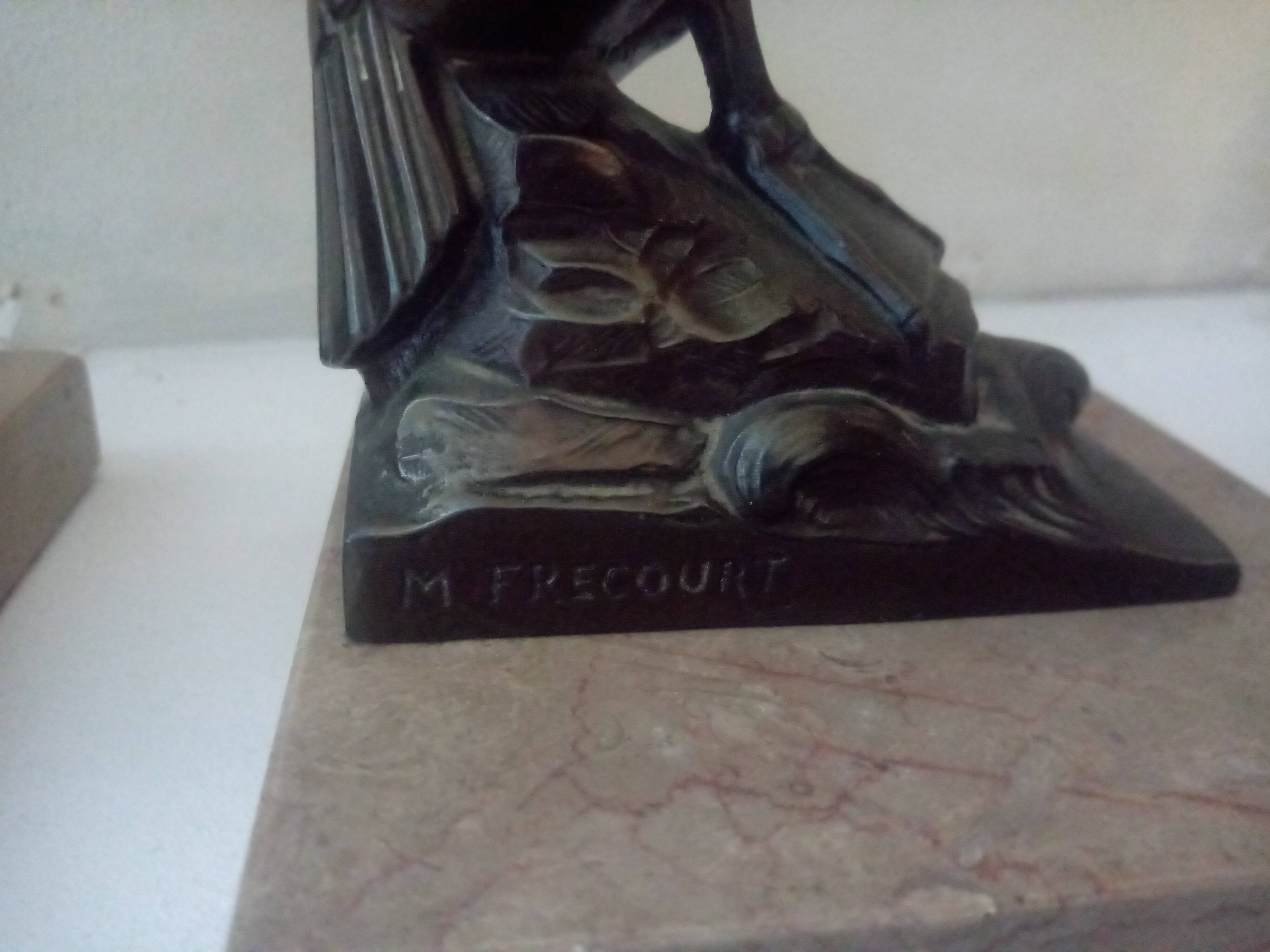 Pelican bookend signed Frecourt