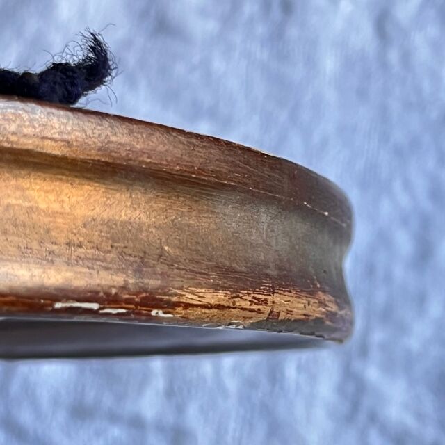 Witch's mirror with wood frame and curved ice