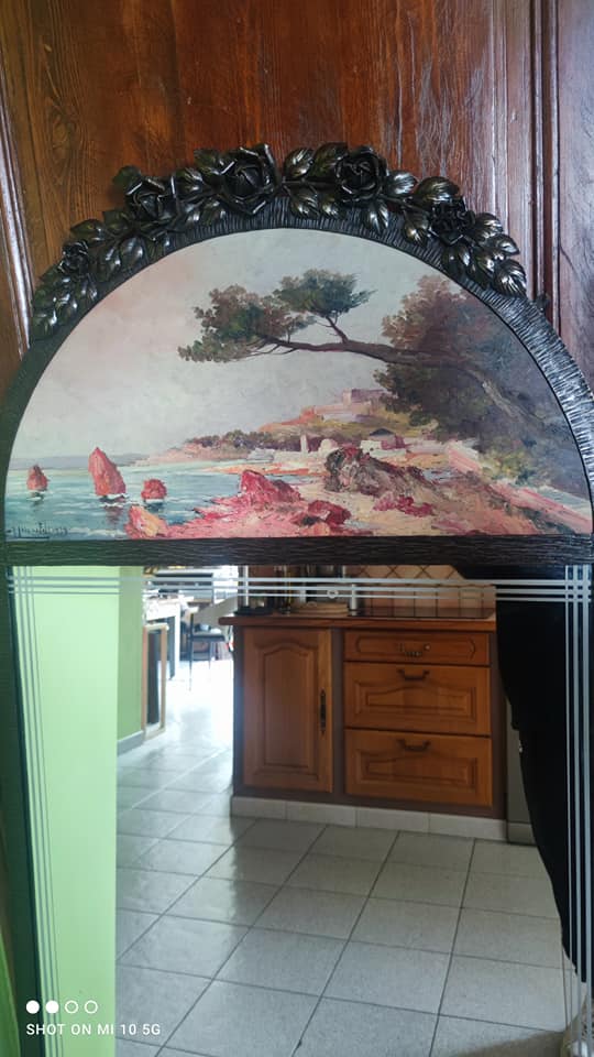 Overmantel mirror from the decorative arts period, 1929, in hammered wrought iron, 75x160cm