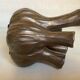 Tulip vase with ceramic flowers in brown and gold.