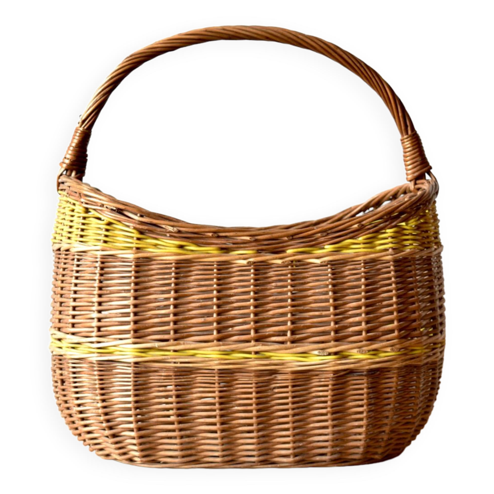 Vintage wicker basket crossed with a yellow scoubidou