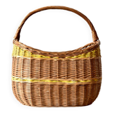 Vintage wicker basket crossed with a yellow scoubidou