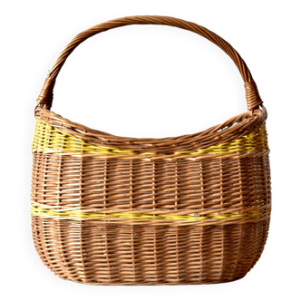 Vintage wicker basket crossed with a yellow scoubidou
