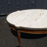 Oval marble and wood coffee table