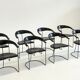 Ensemble de 8 chaises de salle à manger vintage Arrben Ursala en cuir noir.