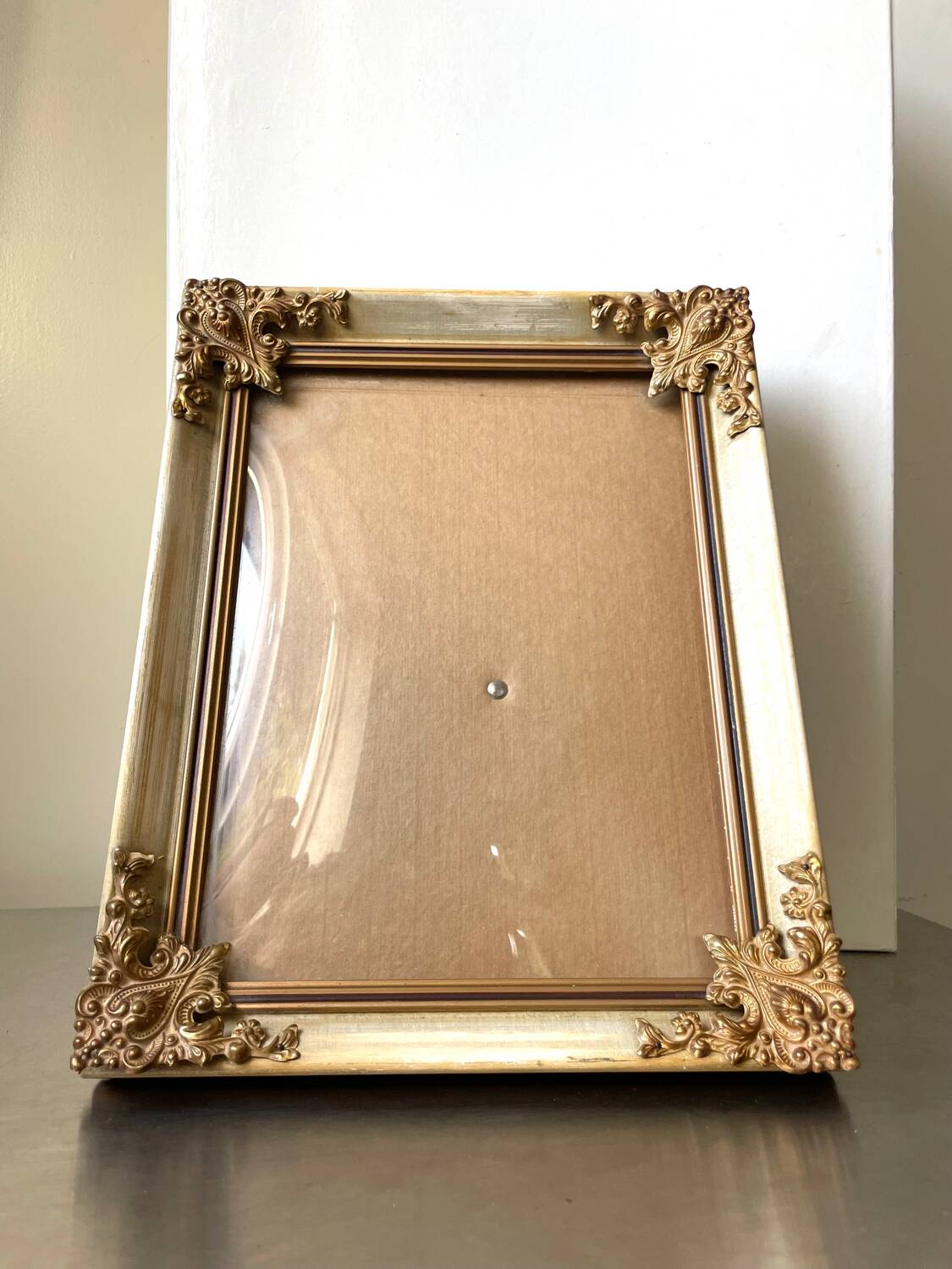 Antique wooden frame with metal gold colored details 28 cm x 22 cm convex glass