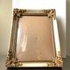 Antique wooden frame with metal gold colored details 28 cm x 22 cm convex glass