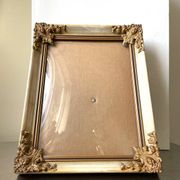 Antique wooden frame with metal gold colored details 28 cm x 22 cm convex glass