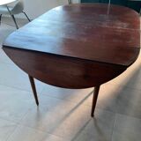 6-foot round mahogany table