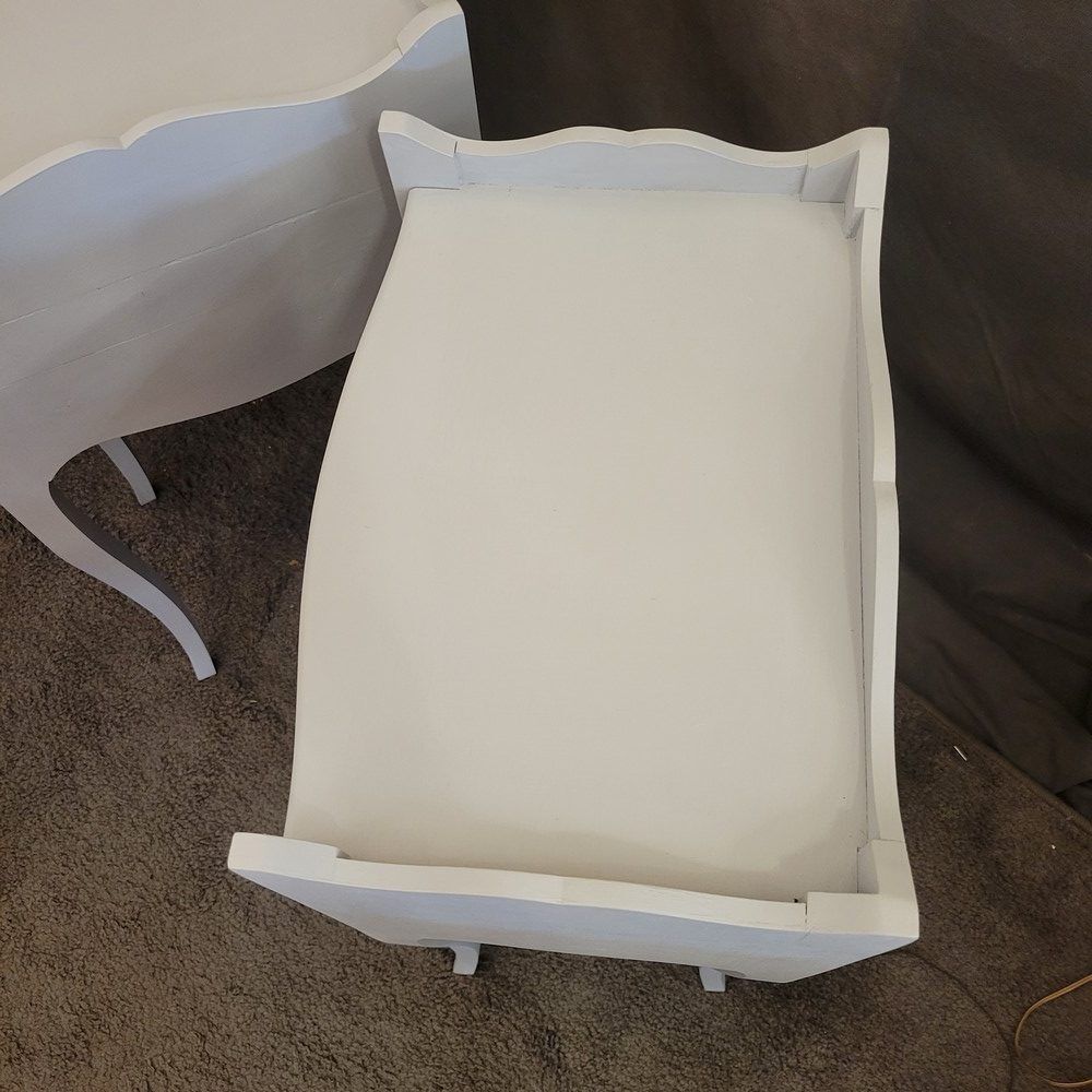 Light grey patinated bedside tables