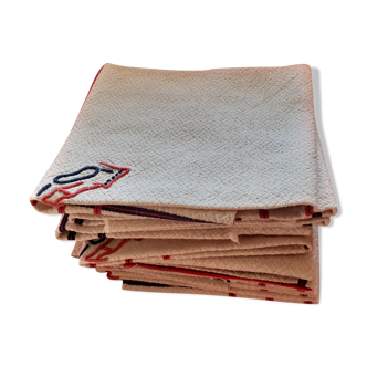 Set de 10 serviettes en coton épais style basque mongramme.