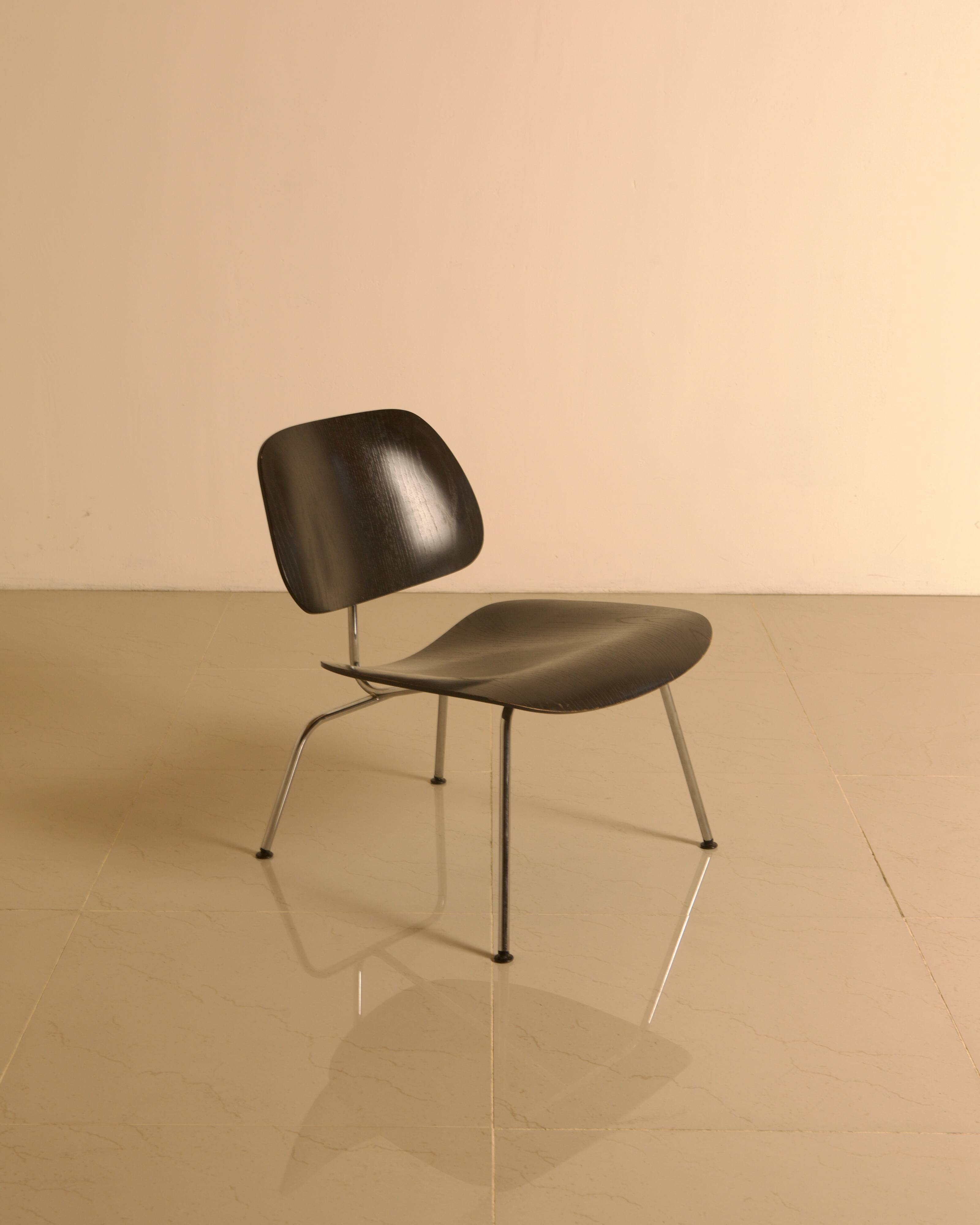 "LCM" chairs in black ash by Charles and Ray Eames for Herman Miller 60s.