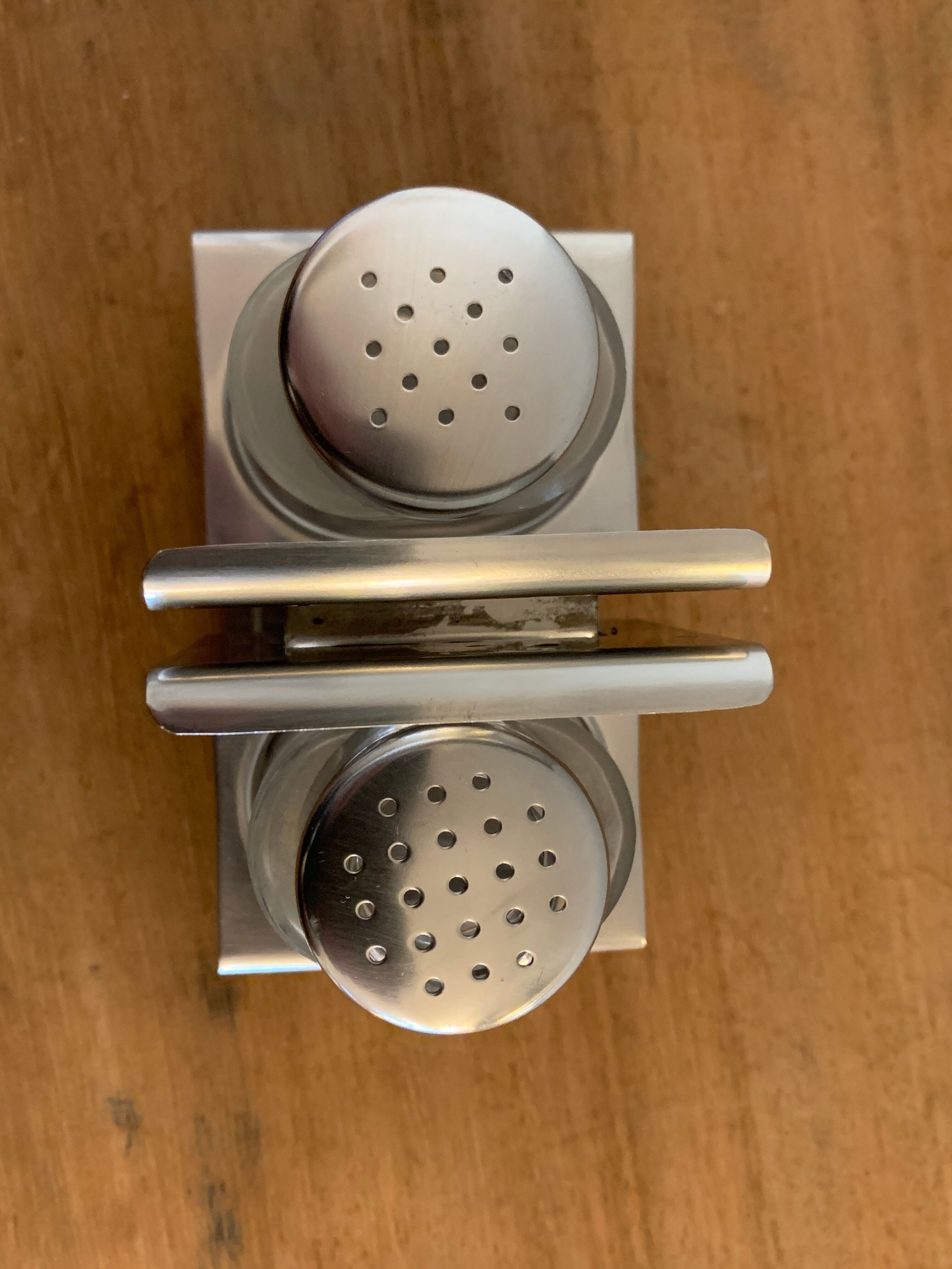 Italian salt and pepper shaker in stainless steel and Alessi glass, 1980