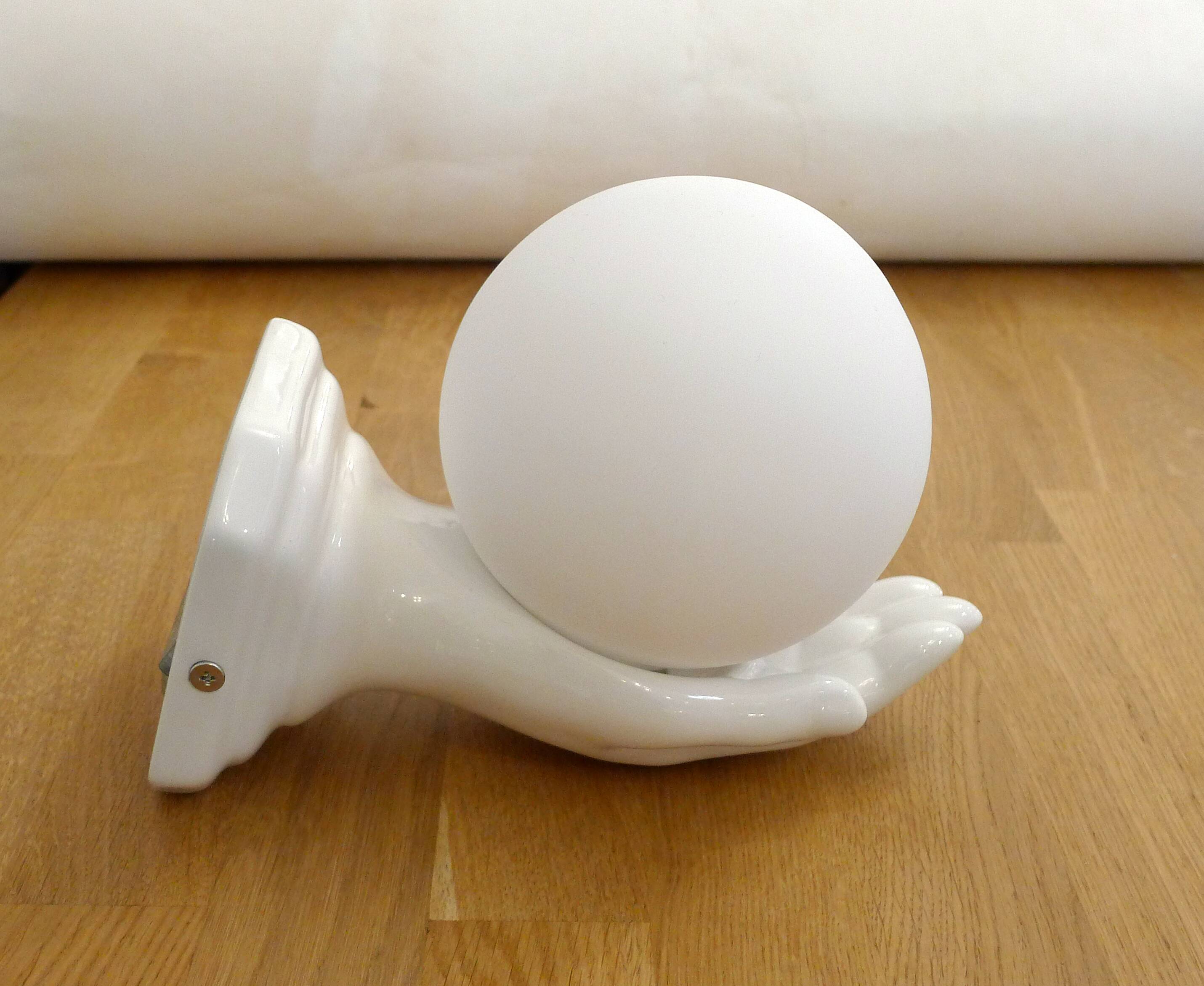 Vintage wall lamp with outstretched hand & opaline globe
