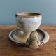 Bird-shaped egg cup in stoneware signed Jean Marie Delahaye Malicornes.