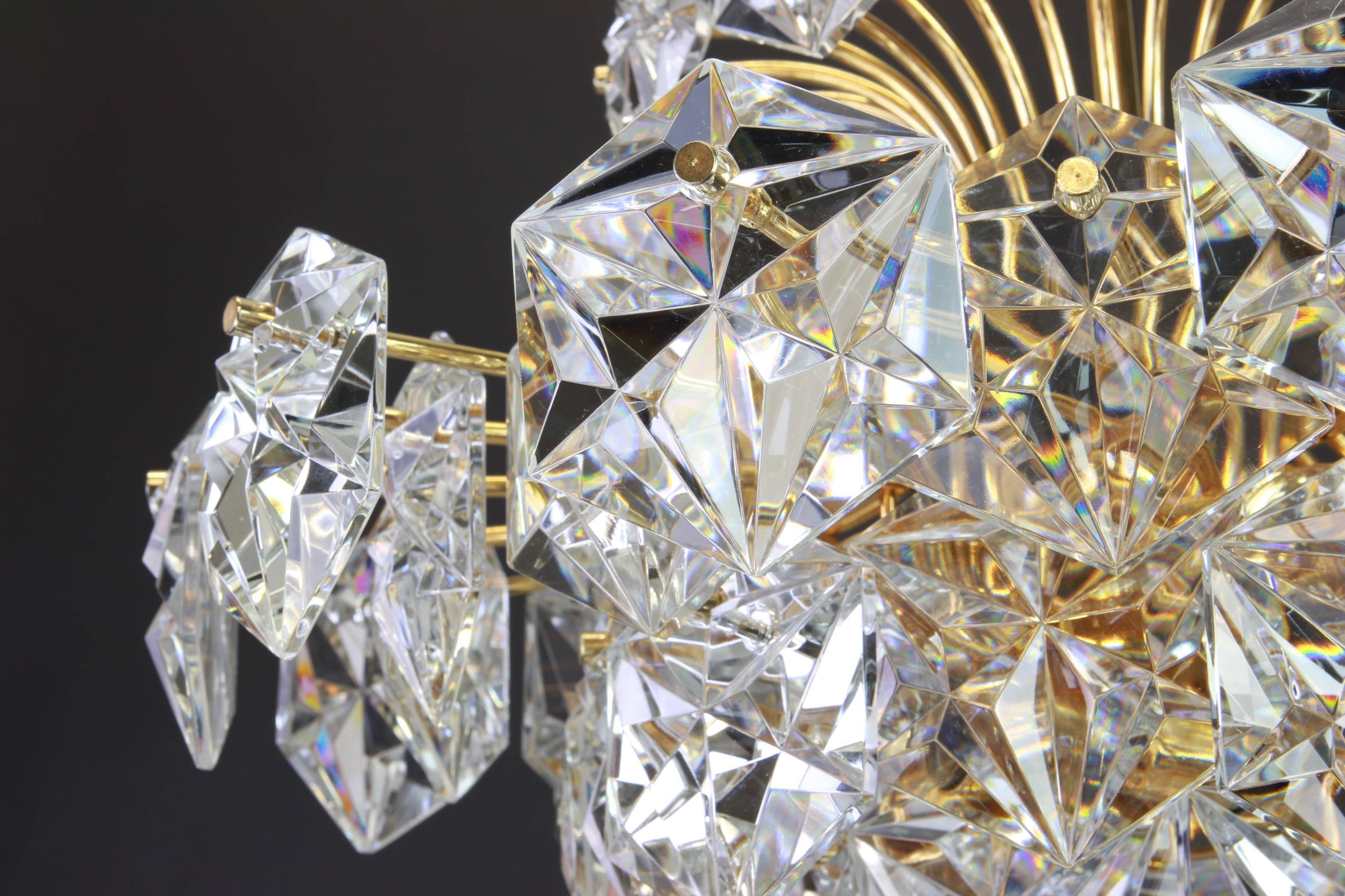 Chandelier in gilded brass and crystal glass by Kinkeldey, Germany, 1970s.