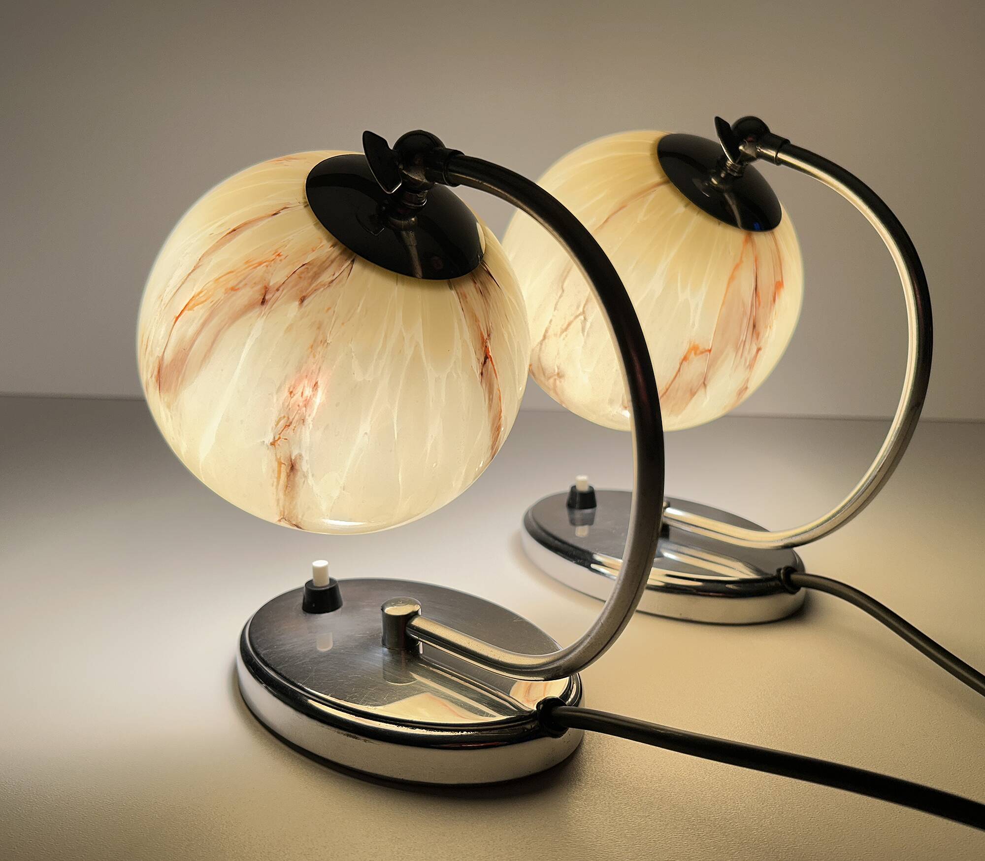 Pair of art deco lamps, chrome glass