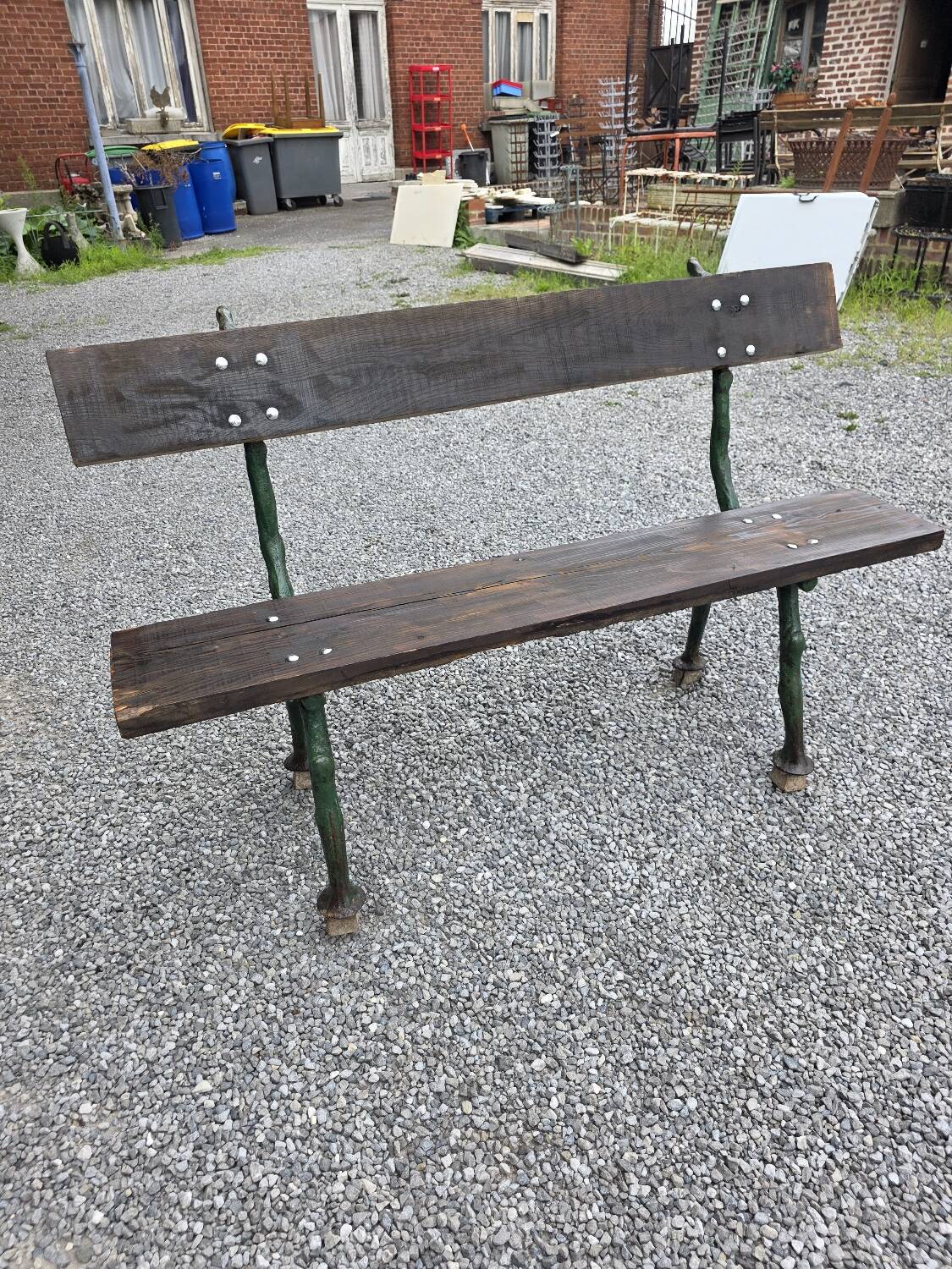 Cast iron garden bench with solid oak seat