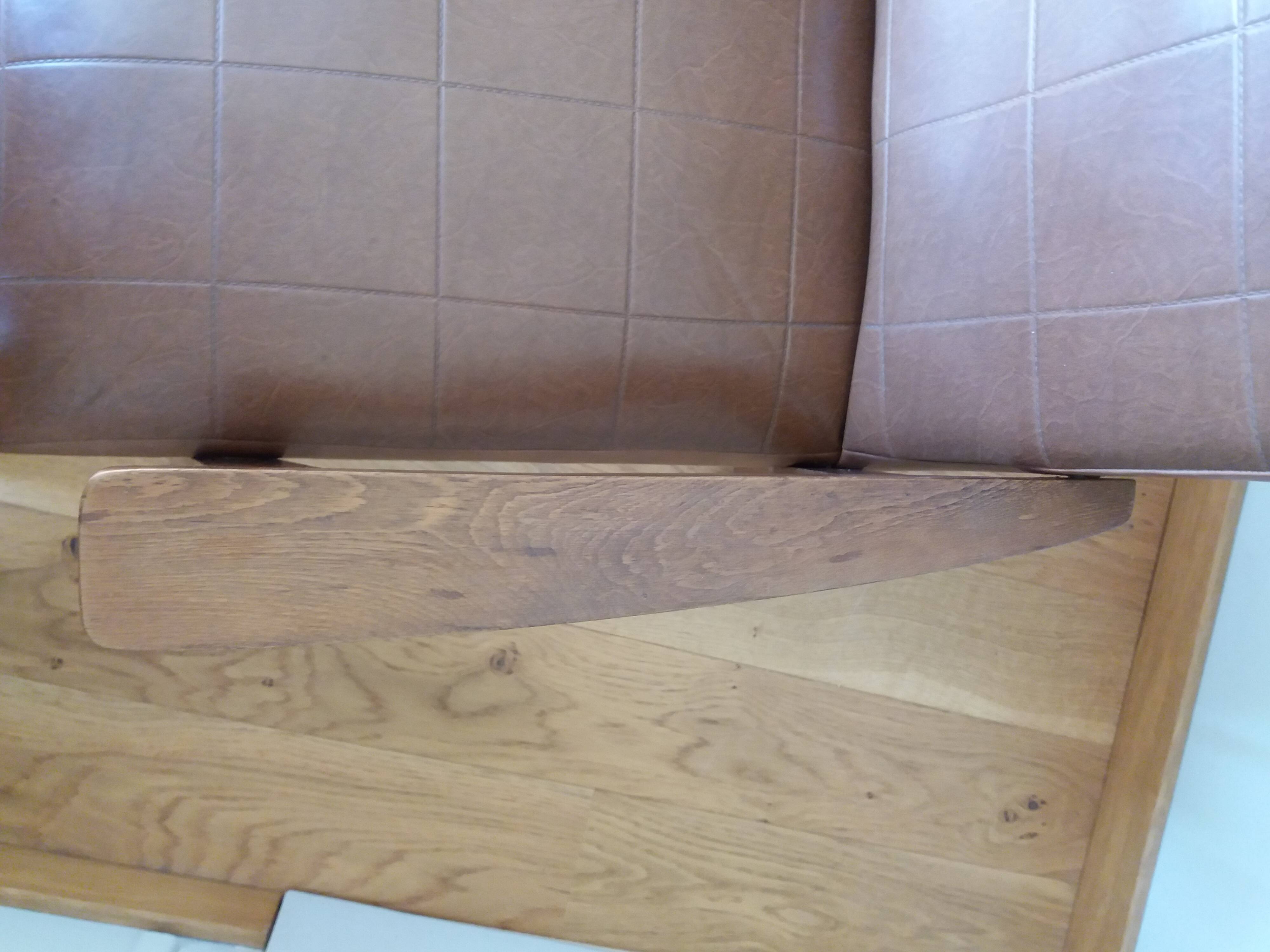 Scandinavian brown skai and wood armchair