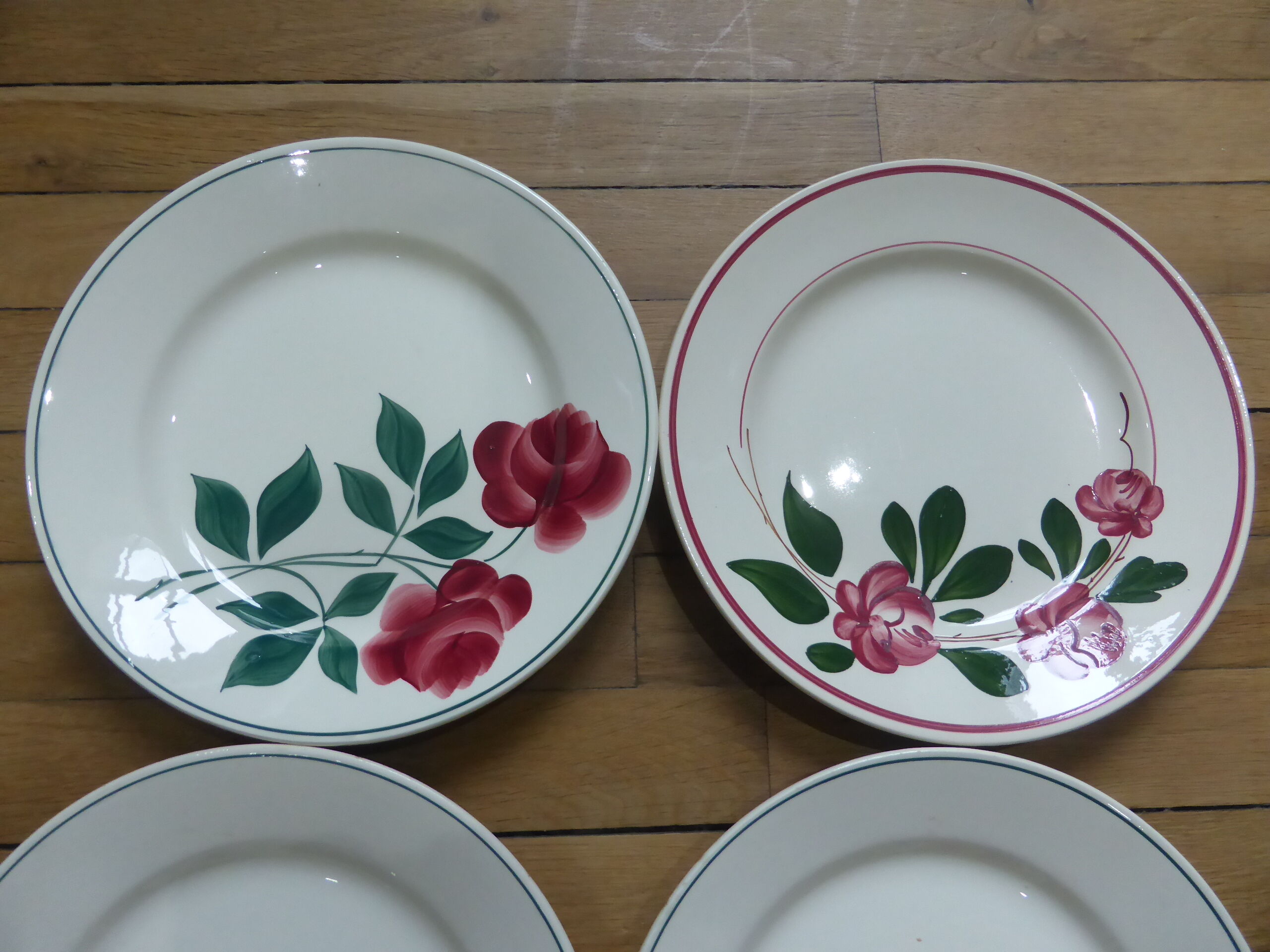 Set of 4 antique mixed flat plates