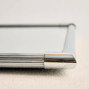 Framed metal mirror