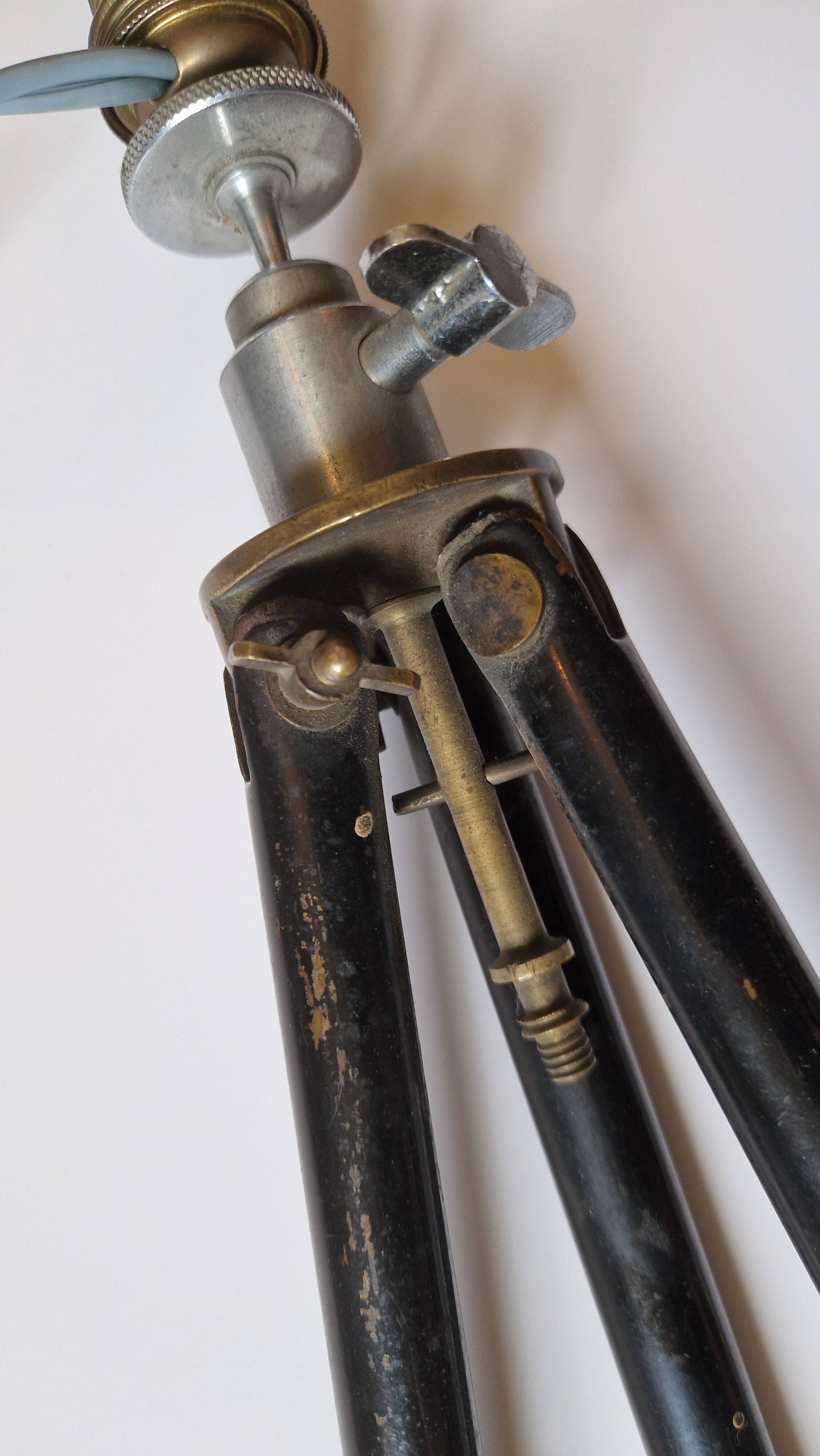 Lamp on old tripod, 1920s