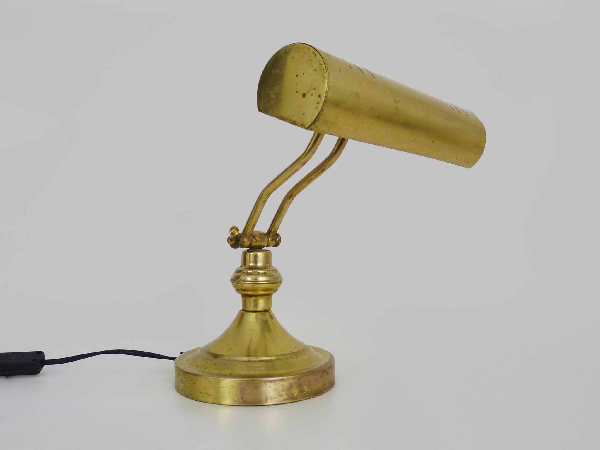 Old articulated piano lamp