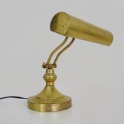Old articulated piano lamp