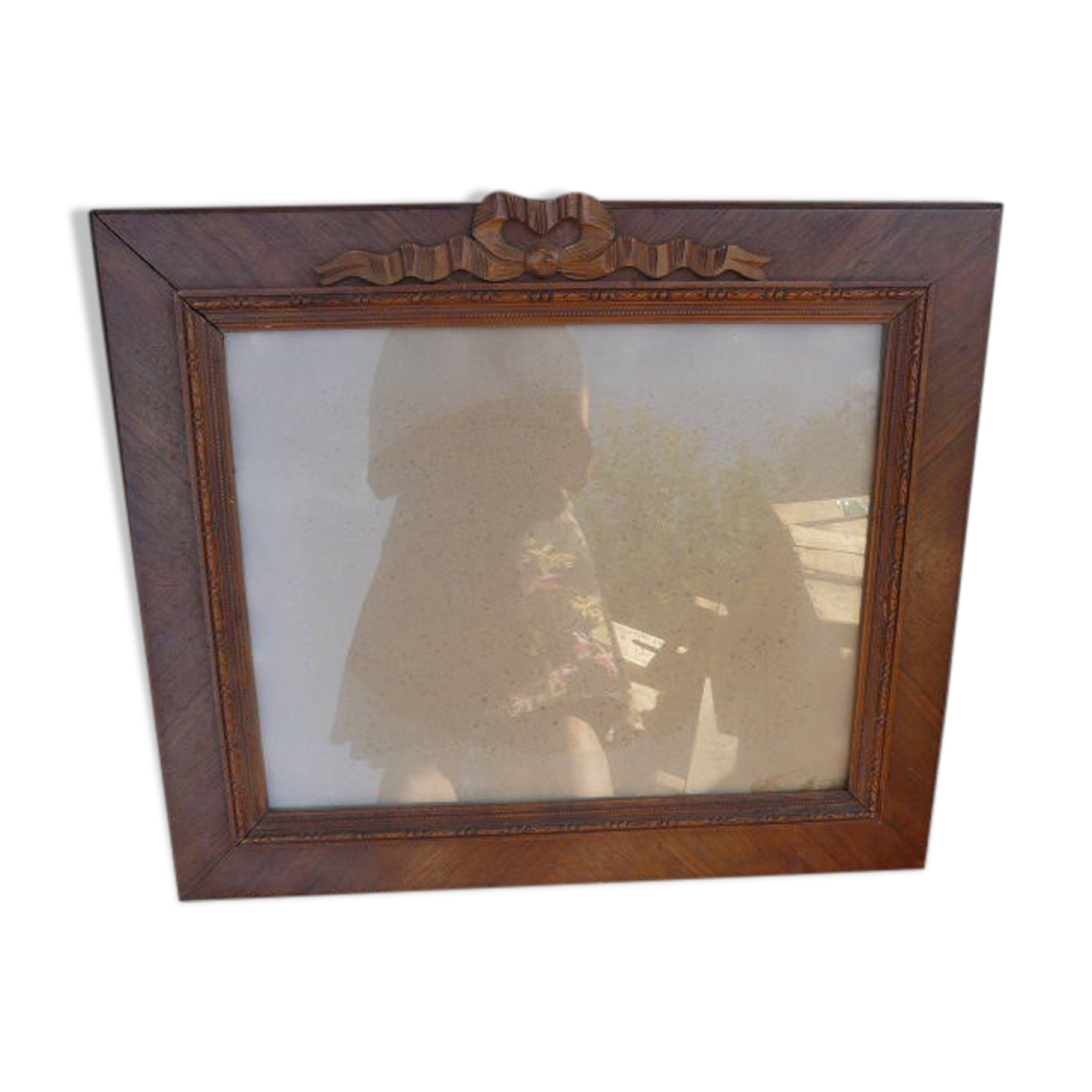 Wooden glass frame with knot
