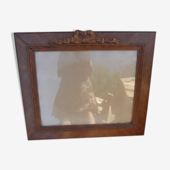 Wooden glass frame with knot